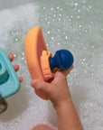 Olive | Man in Boat Bath Toy - Turquoise / Yellow | The Elly Store