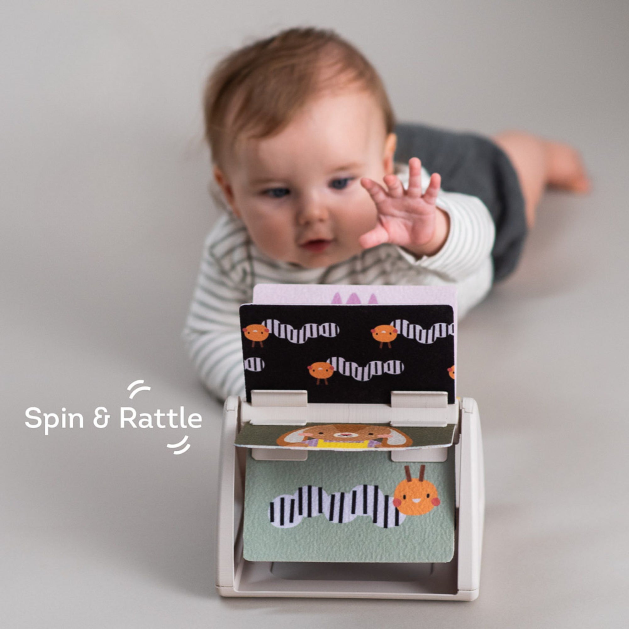 Taf Toys Tummy Time Spinning Book