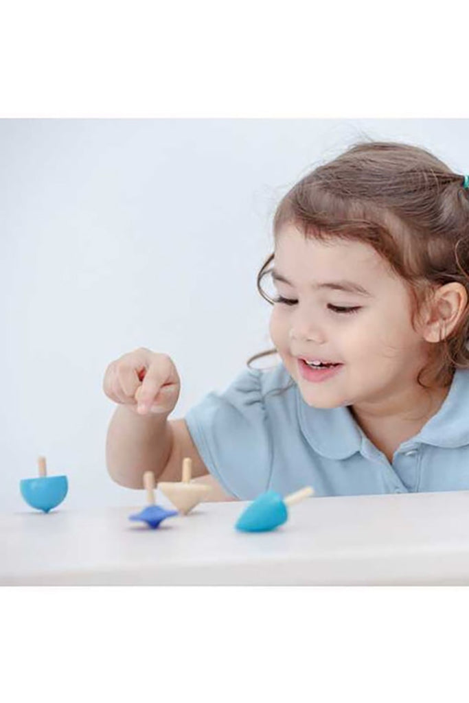 Plan Toys - Mini Spinning Tops (Playing)